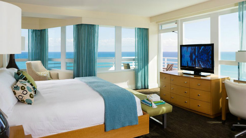 covet-edition-Best-Hotels-in-Miami-Fontainebleau-Miami-Beach-bedroom-ocean-view-balcony